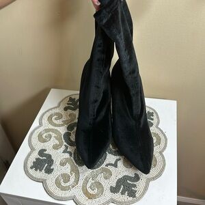 Black ankle sock heel boots